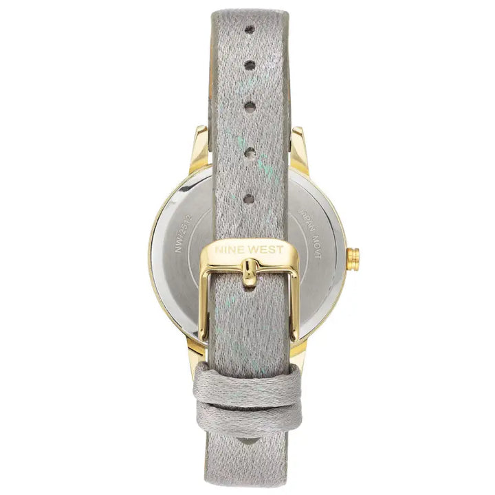 Elegant ladies' gold-tone watch with a grey leather strap and polished dial showcasing the Nine West brand.