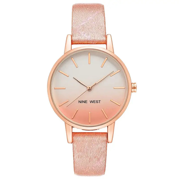 Elegant rose gold ladies' watch with sleek and minimalist design from Nine West NW_2512RGPK, showcased on a neutral background.