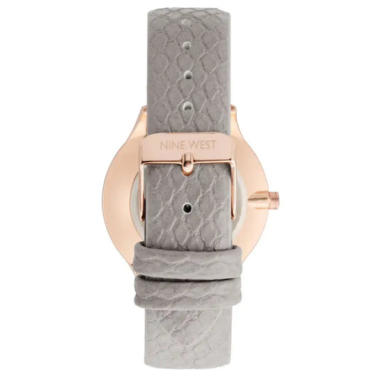 Elegant ladies' watch in rose gold and gray snake-patterned leather strap, showcased on a plain background.