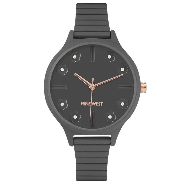 Elegant and stylish ladies' watch by Nine West, featuring a gray stainless steel band and a sleek black dial with rose gold-tone accents.