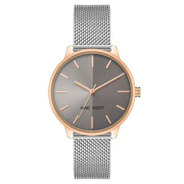 Elegant ladies' watch with a gray and rose gold design. The watch features a stainless steel mesh bracelet and a simple, minimalist dial. This timeless accessory is perfect for adding a touch of sophistication to any outfit.