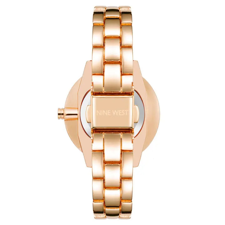 Elegant rose gold-toned ladies' watch with a sleek, modern design by Nine West, showcasing a clean dial and a stylish metal bracelet strap.