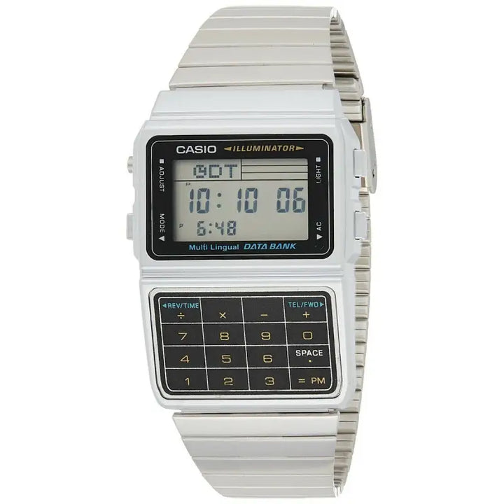 Stainless steel digital watch with a calculator feature and illuminator display. The watch has a grey matte case and a stainless steel bracelet strap. The display shows the time, date, and calculator functions.